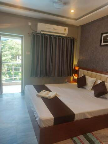 Imagen de la habitación del Hotel Goroomgo Marine Blue Digha. Foto 20