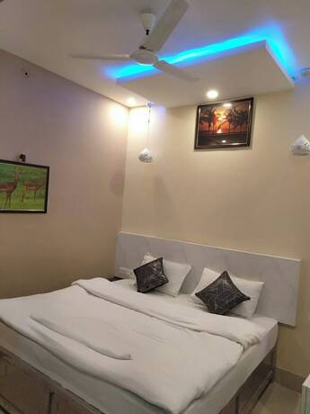 Imagen de la habitación del Hotel Goroomgo Maya Inn Guest House Varanasi. Foto 11