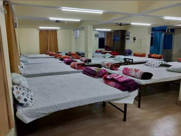Imagen de la habitación del Hotel Goroomgo Mayagiri Patna. Foto 17
