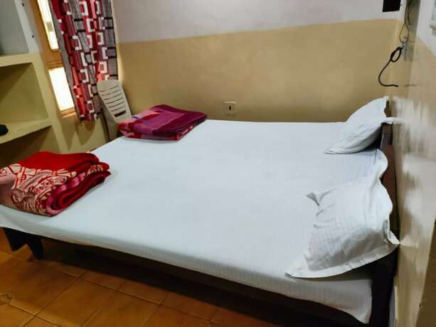 Imagen de la habitación del Hotel Goroomgo Mayagiri Patna. Foto 20
