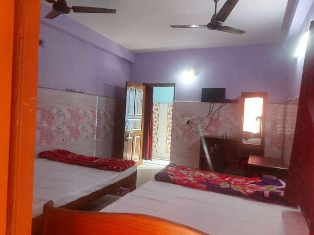 Imagen de la habitación del Hotel Goroomgo Milan Guest House Digha. Foto 14