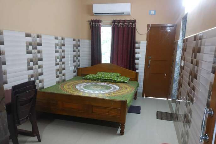 Imagen de la habitación del Hotel Goroomgo Milan Guest House Digha. Foto 15