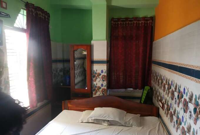 Imagen de la habitación del Hotel Goroomgo Milan Guest House Digha. Foto 17