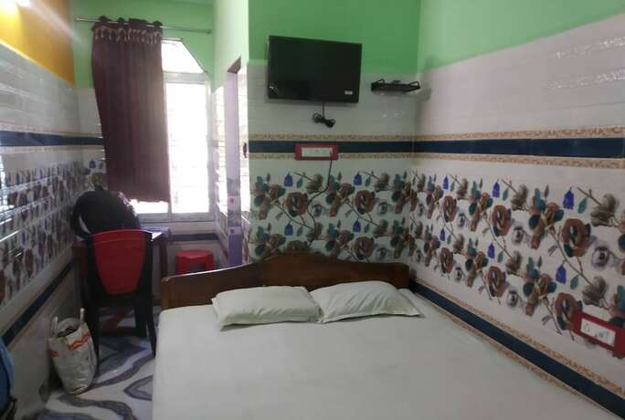 Imagen de la habitación del Hotel Goroomgo Milan Guest House Digha. Foto 18
