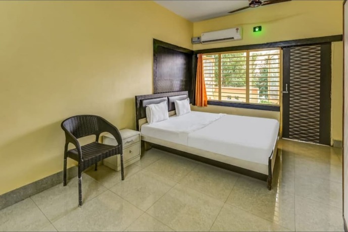 Imagen de la habitación del Hotel Goroomgo Moon CT Road Puri. Foto 14