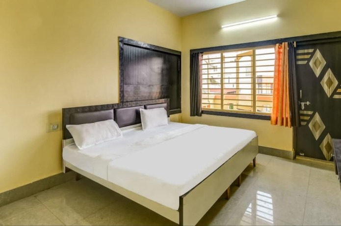 Imagen de la habitación del Hotel Goroomgo Moon CT Road Puri. Foto 17