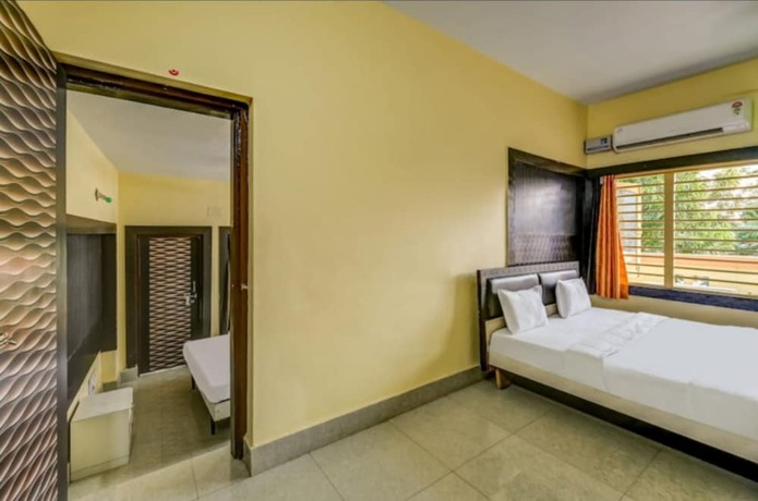 Imagen de la habitación del Hotel Goroomgo Moon CT Road Puri. Foto 20