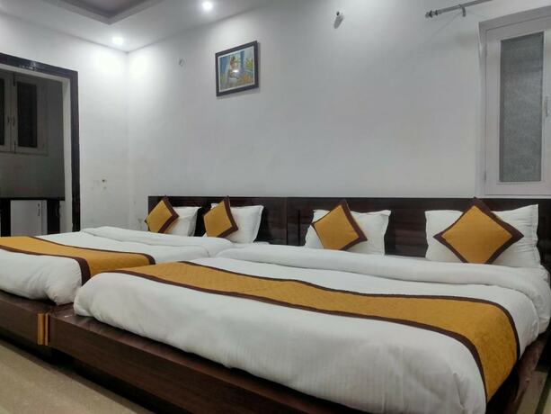 Imagen de la habitación del Hotel Goroomgo Mountain Mist Home Stay Bhimtal. Foto 9