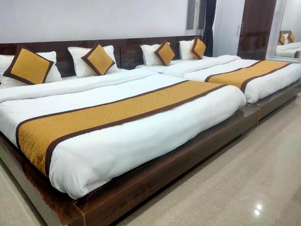 Imagen de la habitación del Hotel Goroomgo Mountain Mist Home Stay Bhimtal. Foto 10