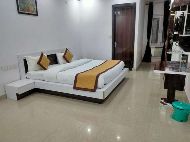 Imagen de la habitación del Hotel Goroomgo Mountain Mist Home Stay Bhimtal. Foto 12