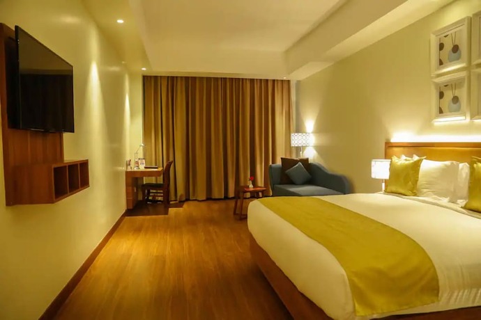 Imagen de la habitación del Hotel Goroomgo Mundrika Deluxe Patna. Foto 8
