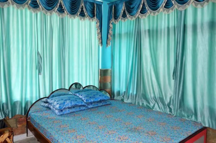 Imagen de la habitación del Hotel Goroomgo Nakshatra Digha. Foto 14