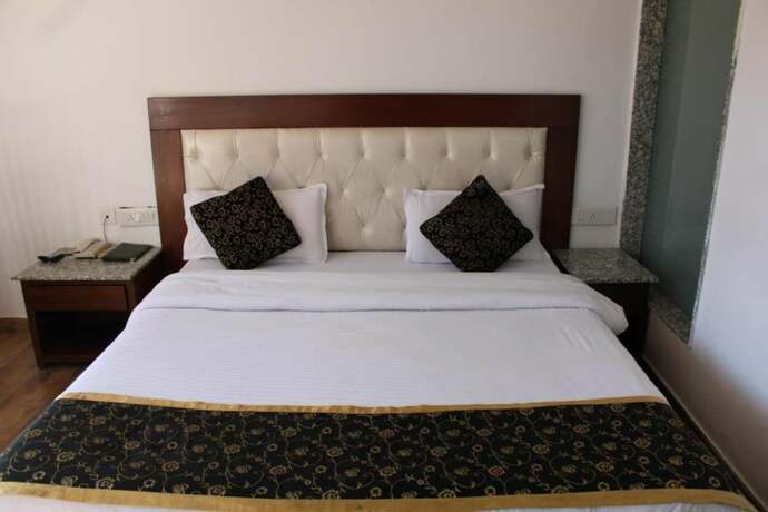 Imagen de la habitación del Hotel Goroomgo Namaskar Heights Dalhousie. Foto 12