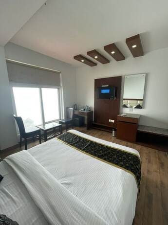 Imagen de la habitación del Hotel Goroomgo Namaskar Heights Dalhousie. Foto 13