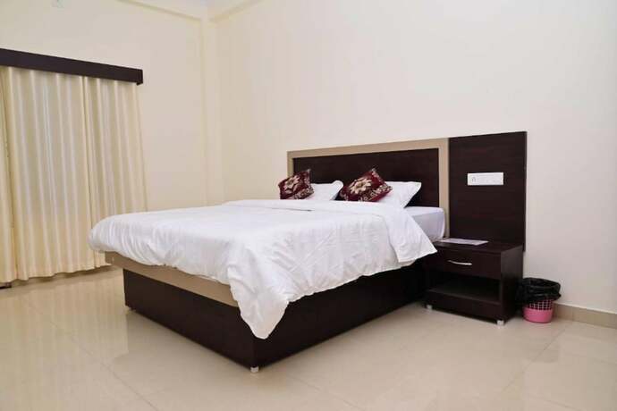 Imagen de la habitación del Hotel Goroomgo Nath Palace Varanasi. Foto 15