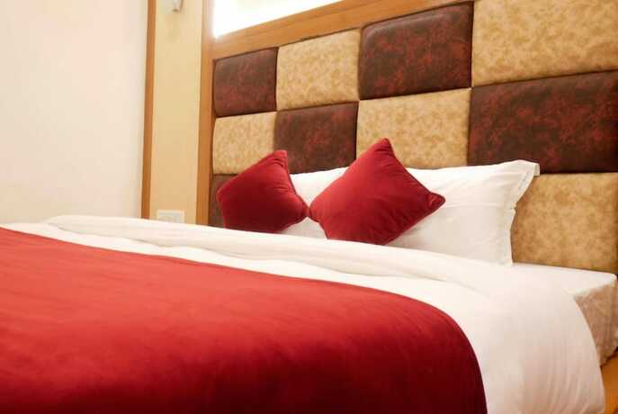 Imagen de la habitación del Hotel Goroomgo New Ambika Mall Road Manali. Foto 15