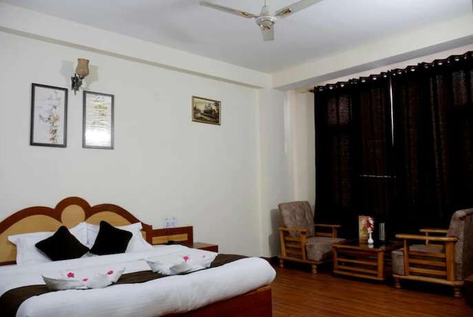 Imagen de la habitación del Hotel Goroomgo New Ambika Mall Road Manali. Foto 17