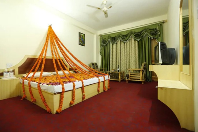 Imagen general del Hotel Goroomgo New Ambika Mall Road Manali. Foto 10