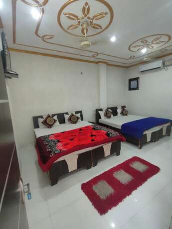Imagen de la habitación del Hotel Goroomgo New Ashiyana Palace Varanasi. Foto 17