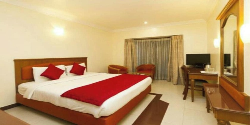 Imagen de la habitación del Hotel Goroomgo New Ashiyana Palace Varanasi. Foto 19