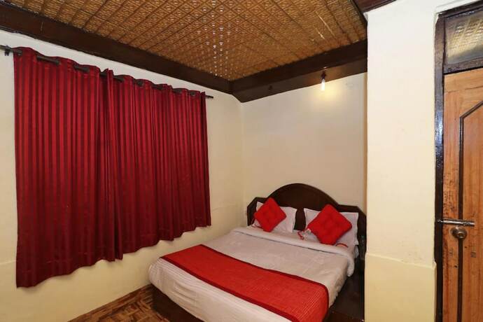 Imagen de la habitación del Hotel Goroomgo New Bharat Nainital. Foto 7