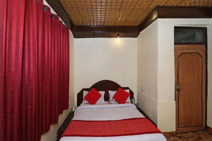 Imagen de la habitación del Hotel Goroomgo New Bharat Nainital. Foto 8
