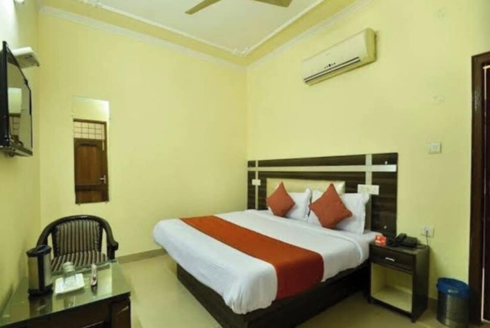 Imagen de la habitación del Hotel Goroomgo New Grand Residency Chandigarh. Foto 18