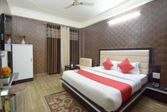 Imagen de la habitación del Hotel Goroomgo Om Sai Residency Bhubneshwar. Foto 10