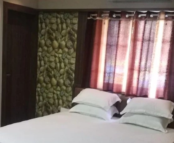 Imagen de la habitación del Hotel Goroomgo Pankaj Palace Jabalpur. Foto 3