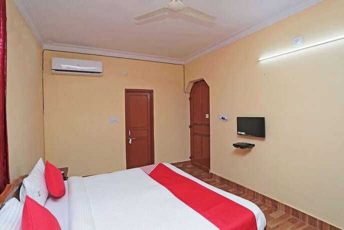 Imagen de la habitación del Hotel Goroomgo Pink Villa Bhubaneswar. Foto 9
