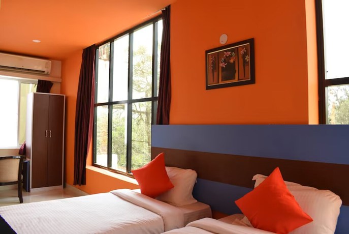 Imagen de la habitación del Hotel Goroomgo Planet Bhubaneswar. Foto 10
