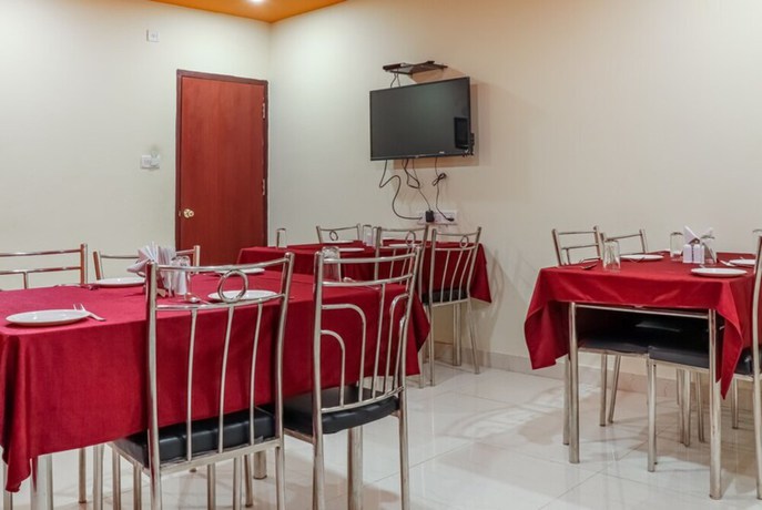 Imagen del bar/restaurante del Hotel Goroomgo Planet Bhubaneswar. Foto 5