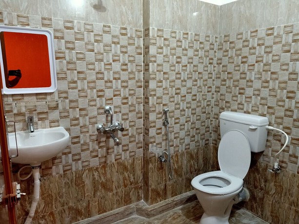Imagen de la habitación del Hotel Goroomgo Planet Bhubaneswar. Foto 13