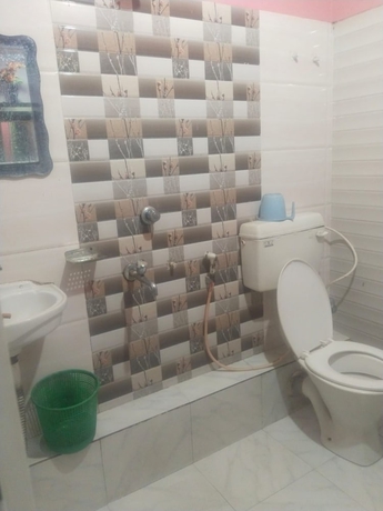 Imagen de la habitación del Hotel Goroomgo Raj Sonia Digha. Foto 17