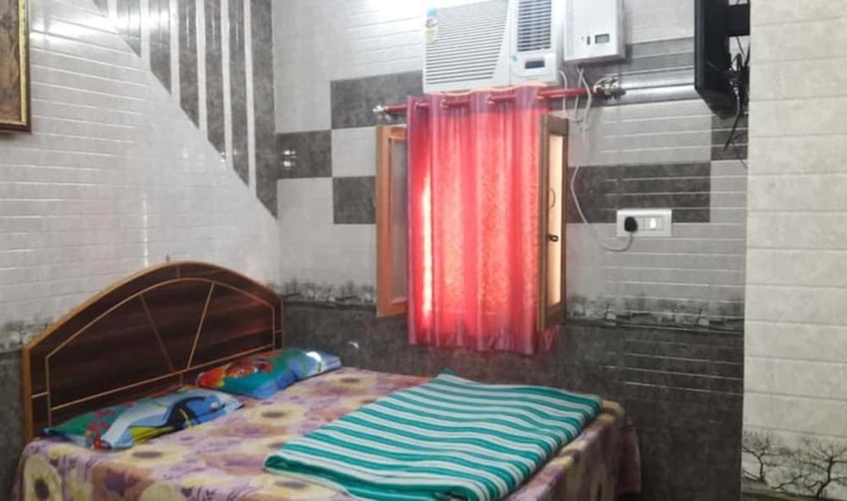 Imagen de la habitación del Hotel Goroomgo Sai Kripa Guest House Haridwar. Foto 6