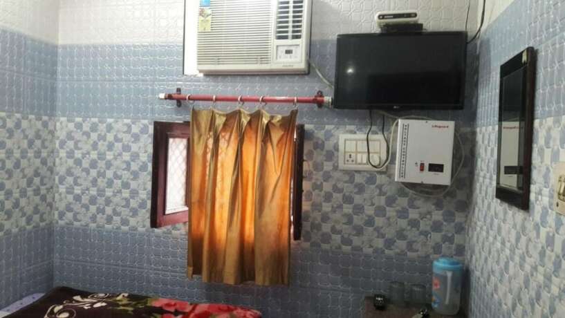 Imagen de la habitación del Hotel Goroomgo Sai Kripa Guest House Haridwar. Foto 8