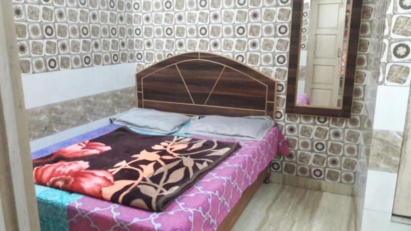 Imagen de la habitación del Hotel Goroomgo Sai Kripa Guest House Haridwar. Foto 9