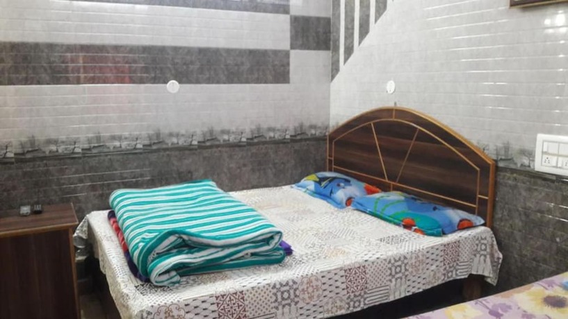 Imagen de la habitación del Hotel Goroomgo Sai Kripa Guest House Haridwar. Foto 12