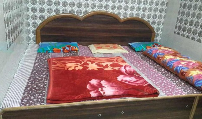 Imagen de la habitación del Hotel Goroomgo Sai Kripa Guest House Haridwar. Foto 13