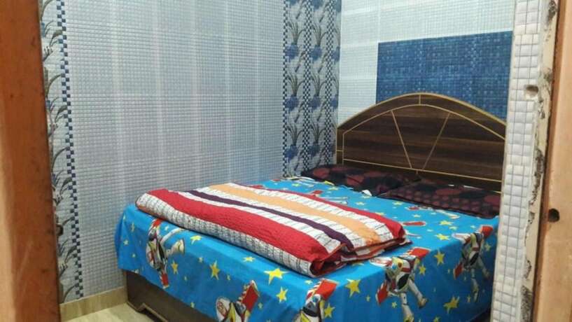 Imagen de la habitación del Hotel Goroomgo Sai Kripa Guest House Haridwar. Foto 14