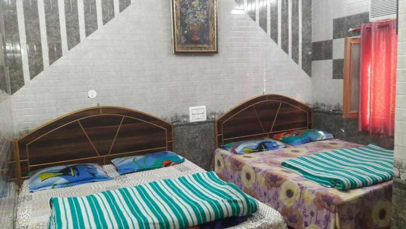 Imagen de la habitación del Hotel Goroomgo Sai Kripa Guest House Haridwar. Foto 15