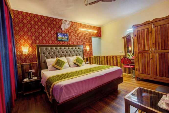 Imagen de la habitación del Hotel Goroomgo Samiru Manali. Foto 15