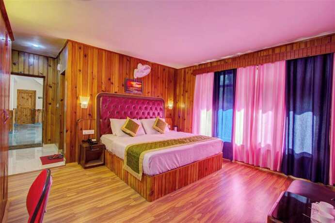 Imagen de la habitación del Hotel Goroomgo Samiru Manali. Foto 17