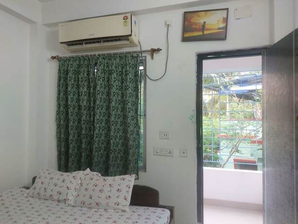 Imagen de la habitación del Hotel Goroomgo Sandhya Guest House Digha. Foto 15