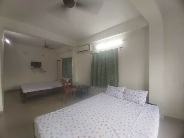 Imagen de la habitación del Hotel Goroomgo Sandhya Guest House Digha. Foto 18