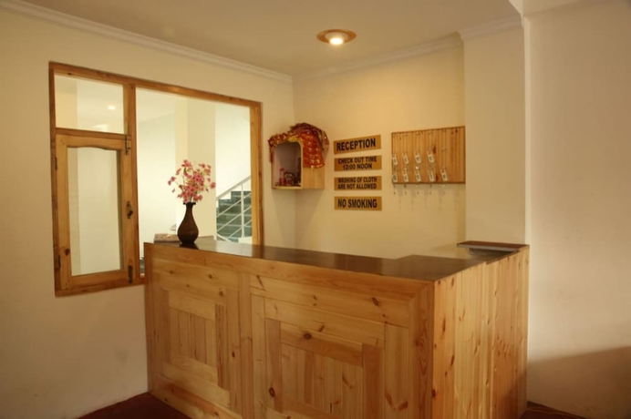Imagen de los interiores del Hotel Goroomgo Saras Manali. Foto 18