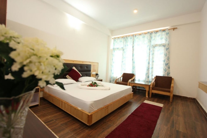 Imagen de la habitación del Hotel Goroomgo Saras Manali. Foto 10