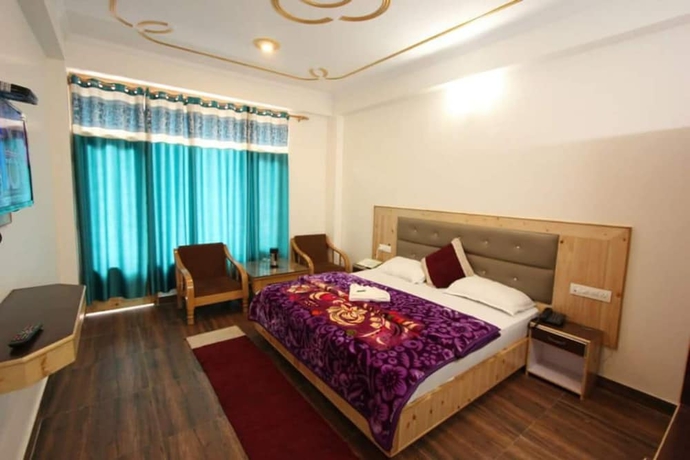 Imagen de la habitación del Hotel Goroomgo Saras Manali. Foto 11