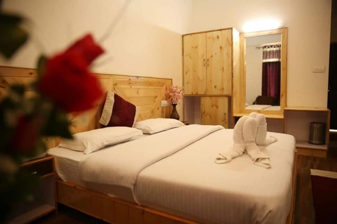 Imagen de la habitación del Hotel Goroomgo Saras Manali. Foto 14