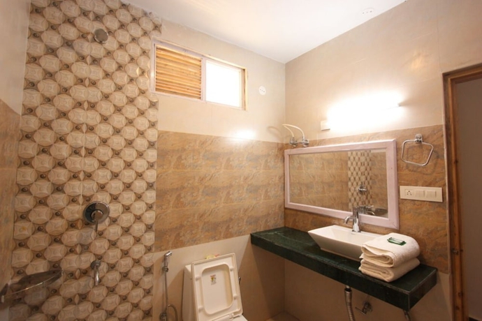 Imagen de la habitación del Hotel Goroomgo Saras Manali. Foto 15